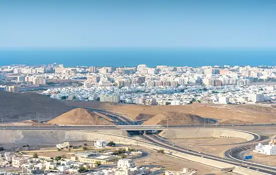 A wide view of a residential area in Oman reflecting the growth of the real estate sector.