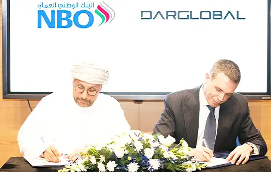 NBO Signs Credit Facilities Agreement with Dar Global to Support AIDA Integrated Tourism Project 1 An image capturing the signing ceremony between the National Bank of Oman (NBO) and Dar Global for financing the luxury AIDA tourism project in Oman