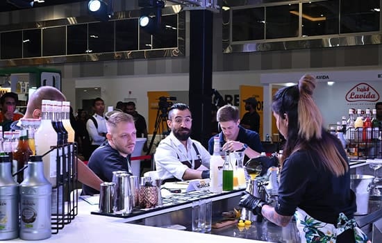 Judges evaluating participants in the Barista and Latte Art Competition at HORECA Oman 2025